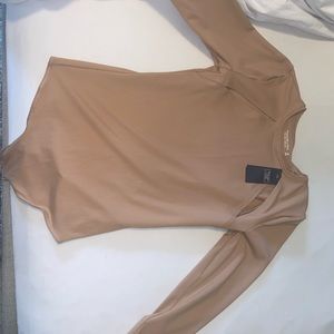 Abercrombie and Fitch medium nude body suit never worn